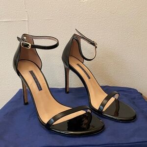 Stuart Weitzman Nudistsong Heel in Black Patent Leather